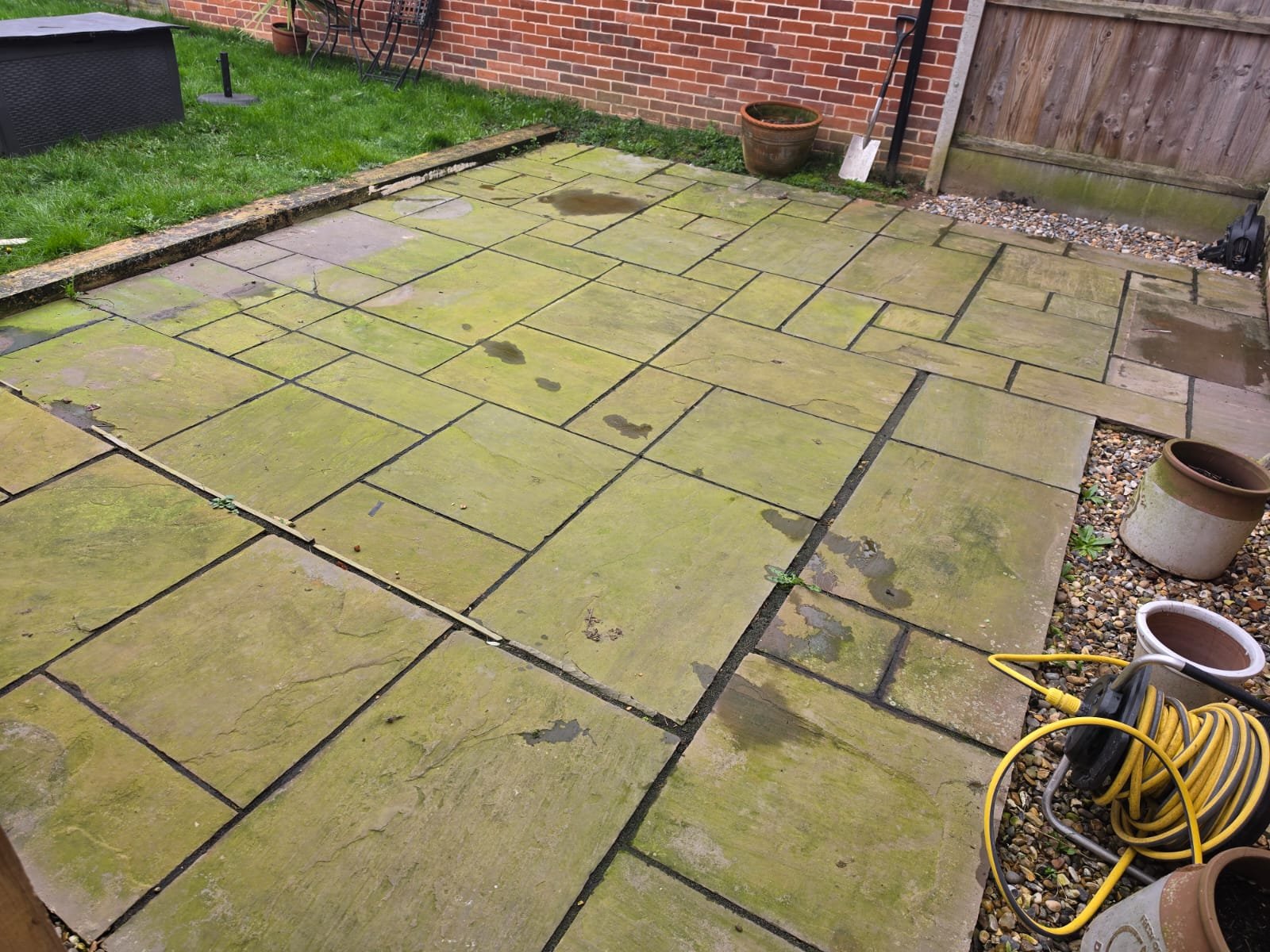 Driveway or patio before cleaning